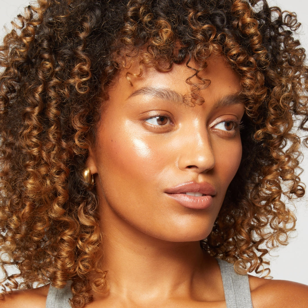 example make up on a model with medium dark skin - Lite Copper