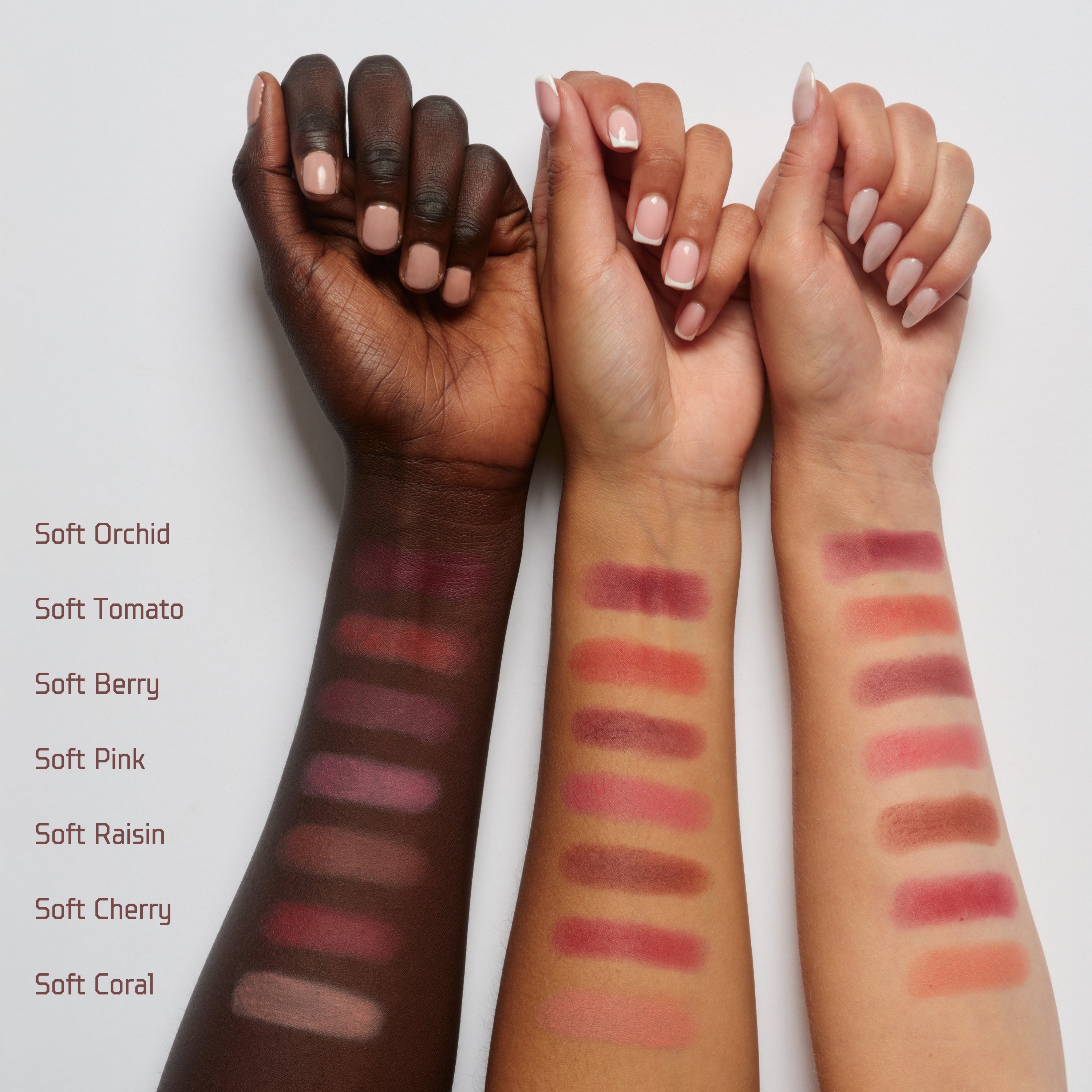Soft Tomato - A Lush Red, Soft Smudge Swatches on 3 arms of different skin tones
